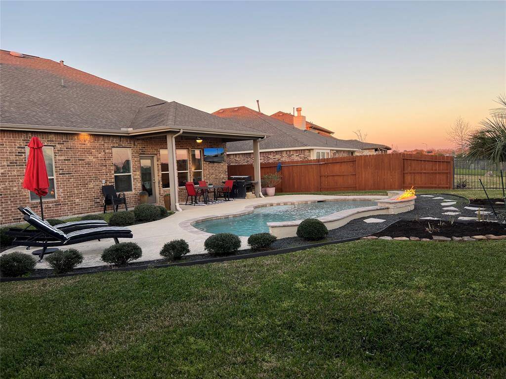 Well maintained backyard perfect for creating memories.