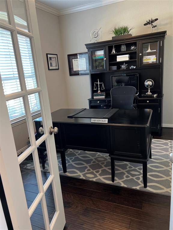 Office/library is perfect for working from home with provided privacy from french doors.