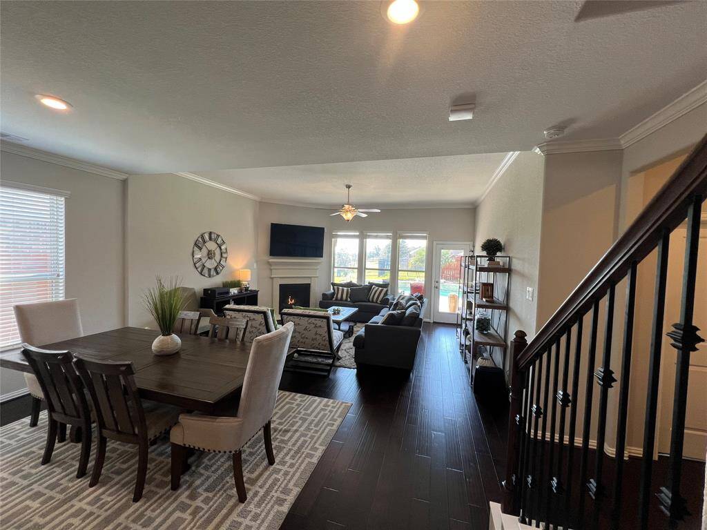 Dining area features plenty of natural lighting with timeless details and direct access to the kitchen and family room.