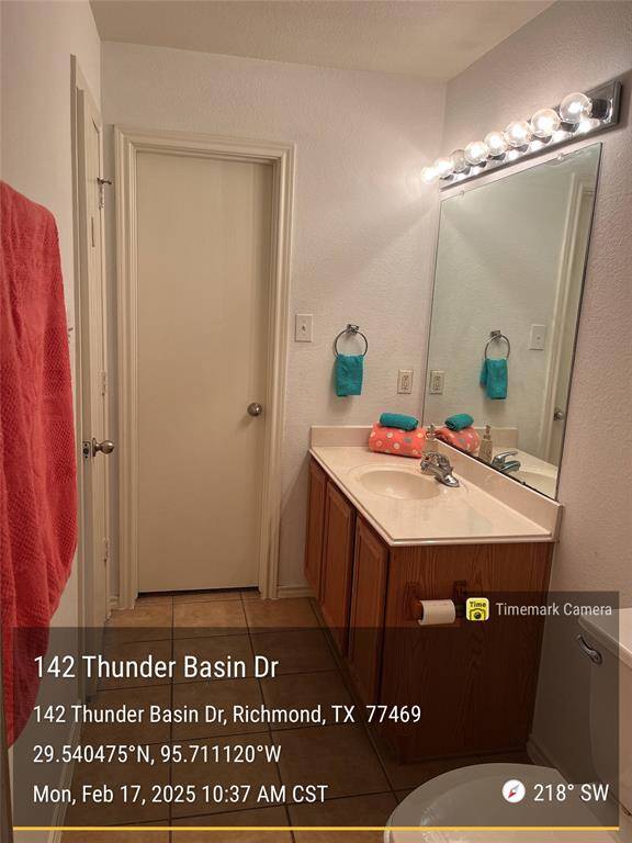 Master Bathroom. Door at rear leads to walking closet.