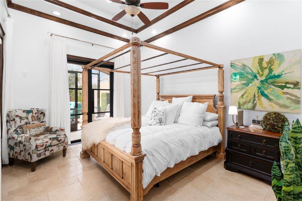 Bedroom downstairs that opens to the backyard.