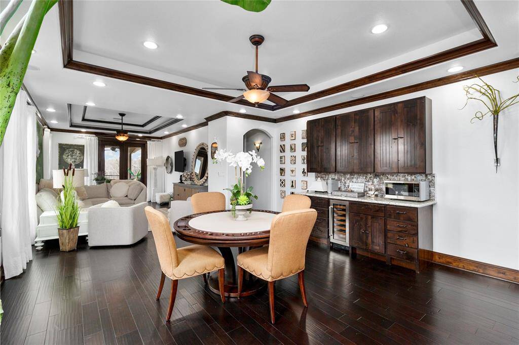 Upper landing with a dry bar and room for a table.