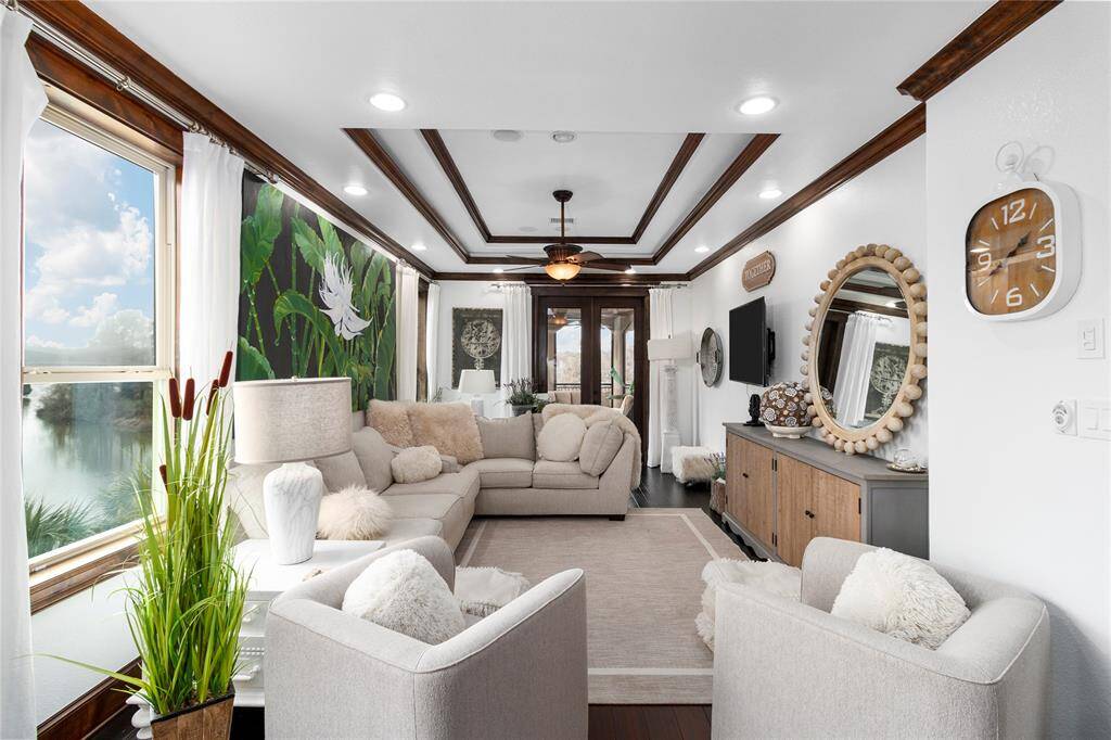 Upstairs living room leads out to the upper balcony for killer views!