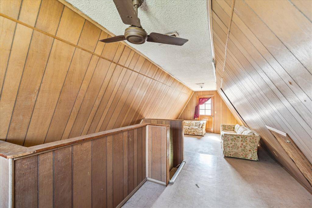 Gameroom with double balcony upstairs.