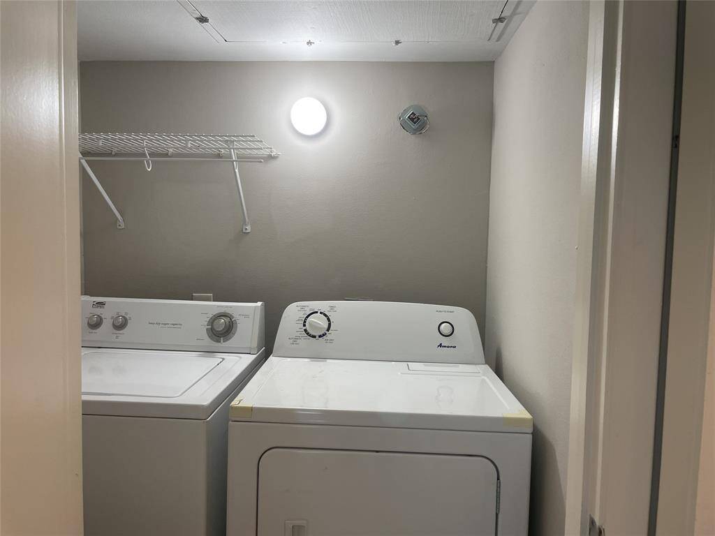Laundry area full size washer dryer
