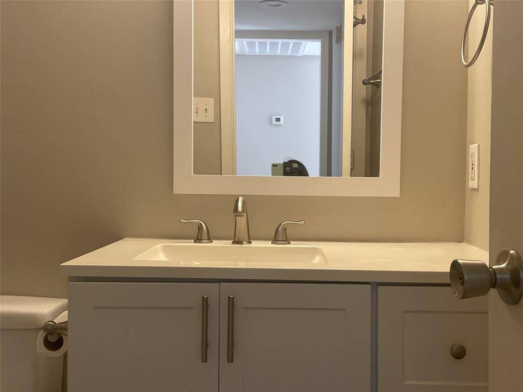 Bathroom with vanity storage drawers