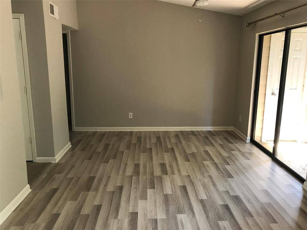 Luxury vinyl plank flooring patio access to right