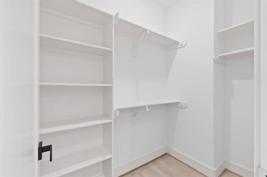 Secondary bedrooms both have large walk-in closets.