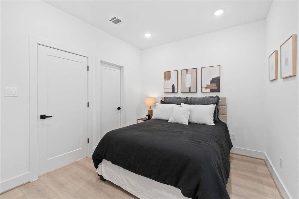 Second spacious secondary bedroom with walk-in closet and direct bathroom access.