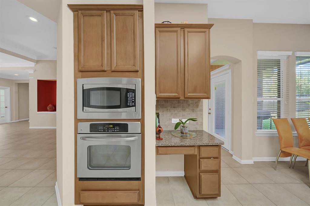 The kitchen includes a built-in oven and microwave and space for the chef to meal plan.
