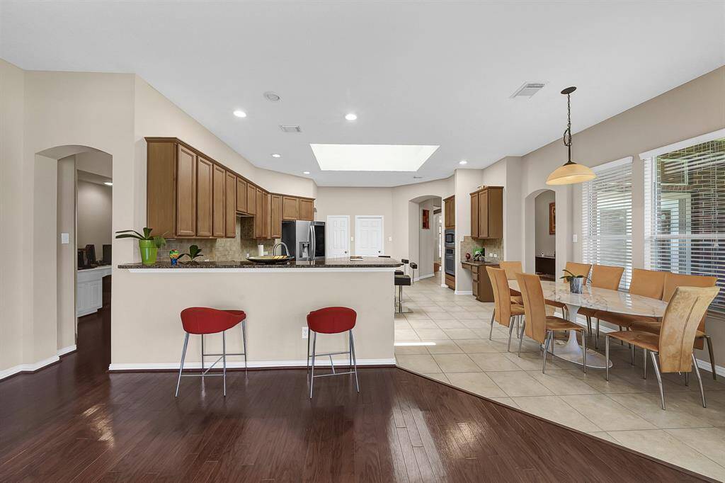Alternate view of the kitchen and breakfast area from the living room.