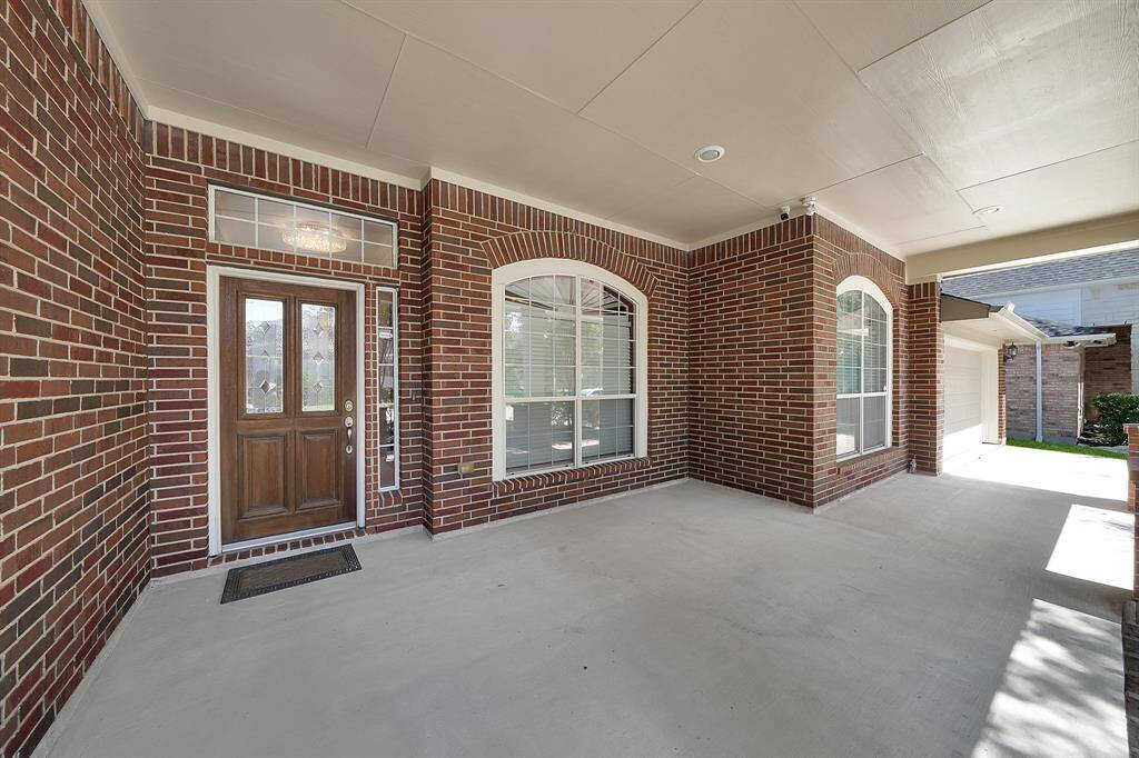 Spacious front patio perfect for relaxing