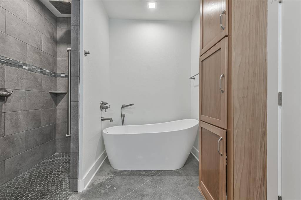 Impressive walk-in shower and soaking tub in the primary bath