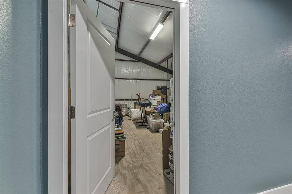 One of two storage areas adjacent to the media room.