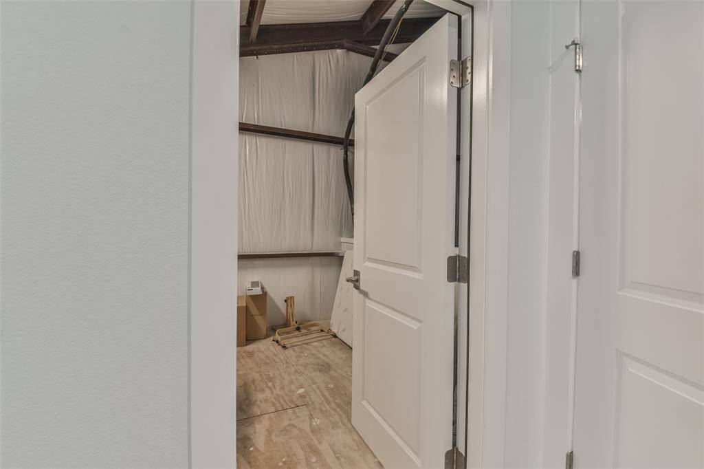 Large storage area off flex room waiting to convert into your dream closet
