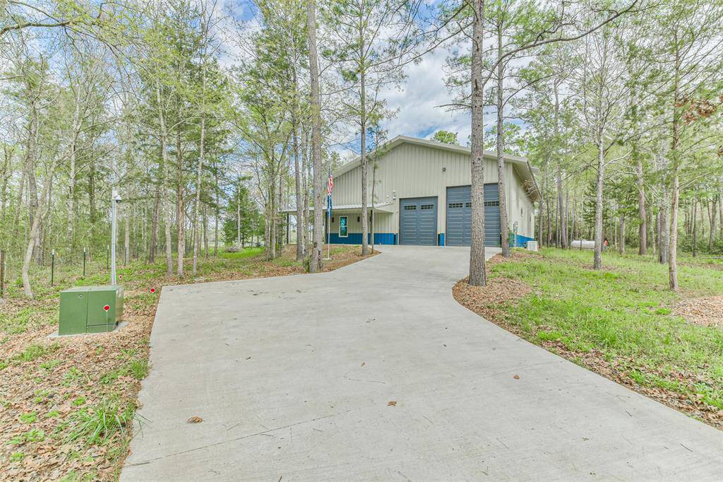 Spacious Double Wide Driveway with ample room on the left side.