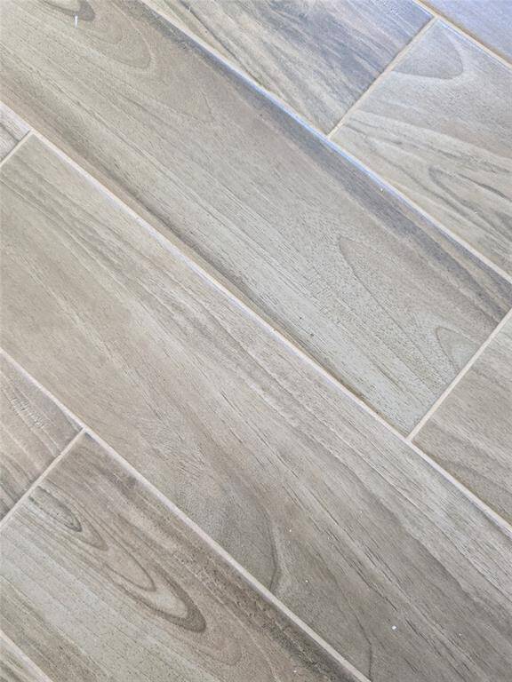 A close-up of wood-look tile flooring.