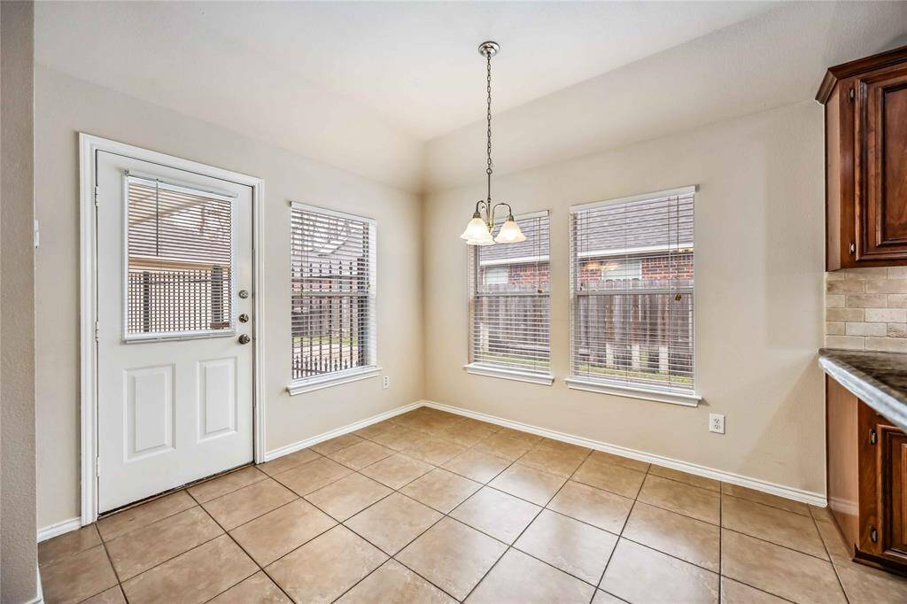 Breakfast room with a lot of natural light.