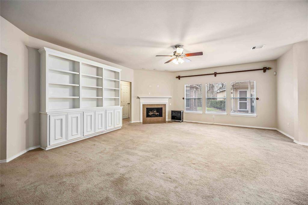 living room with custom build cabinet.