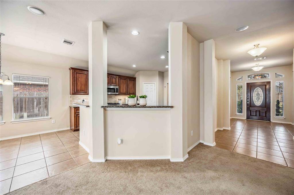 view from living room towards hallway and kitchen