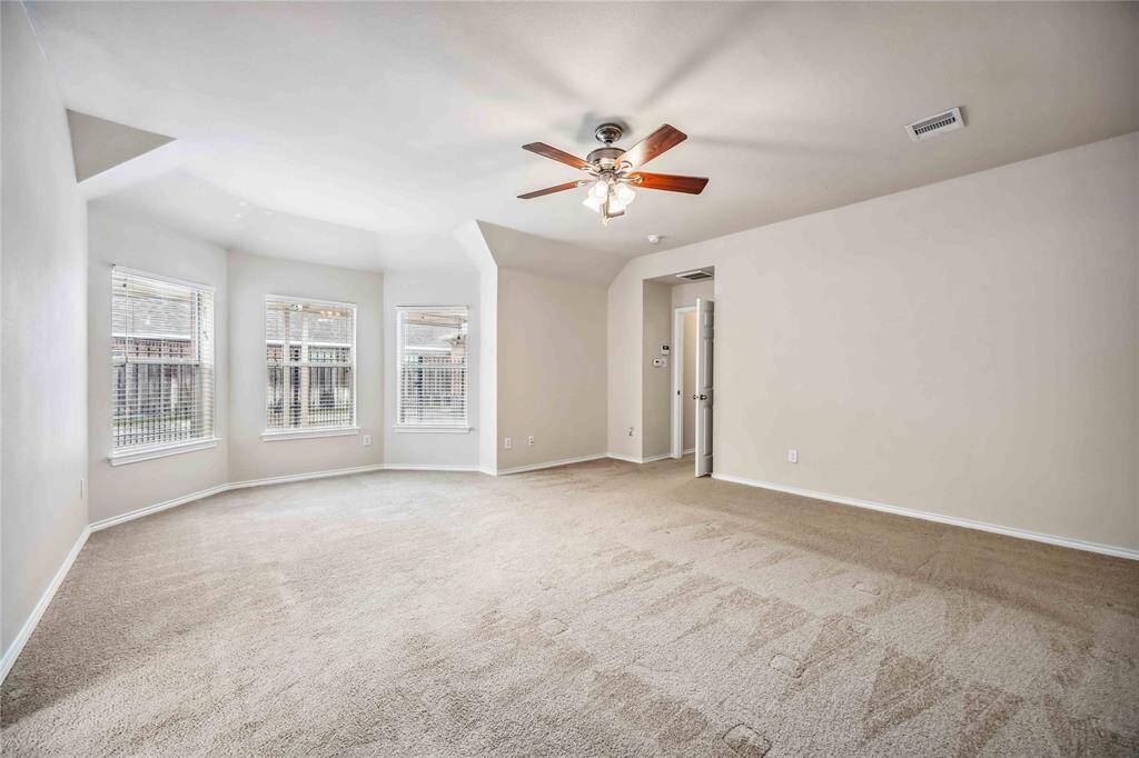 Large primary bedroom with sitting area