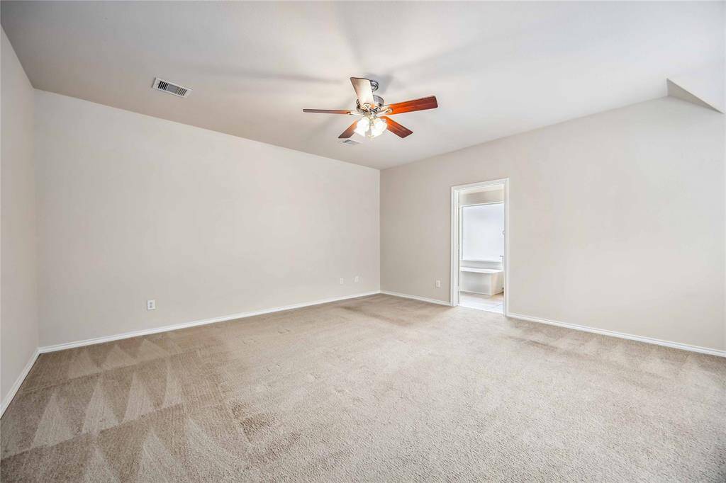 Large primary bedroom with sitting area