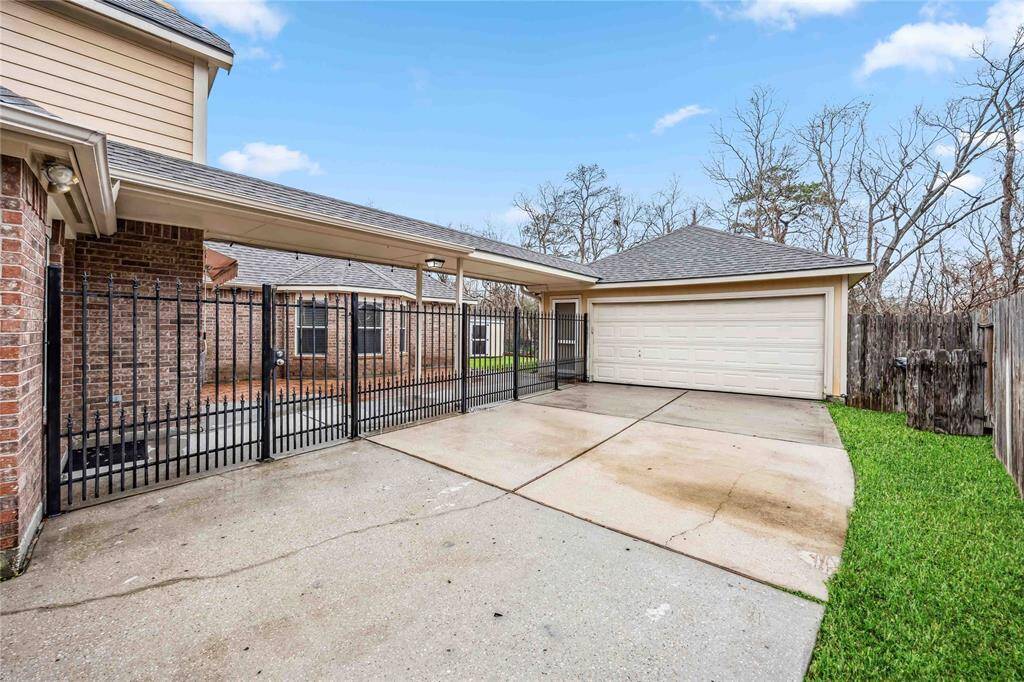 oversized 2 car garage with space for workshop or extra storage