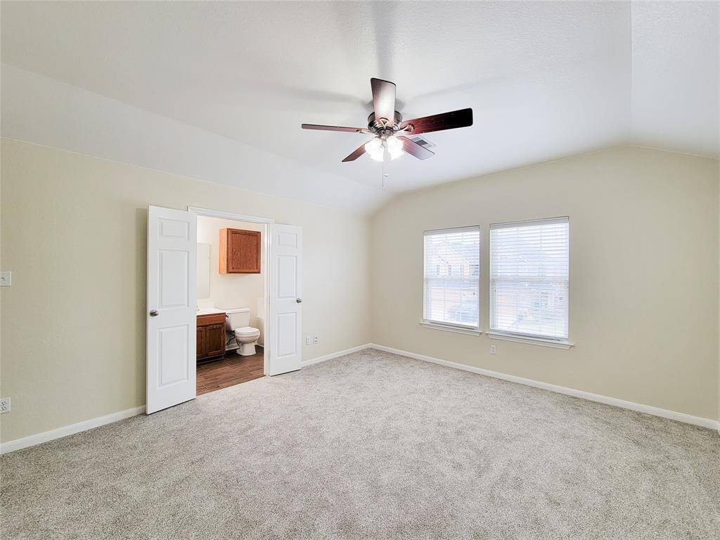 You easily fit a California King bed in this bedroom...