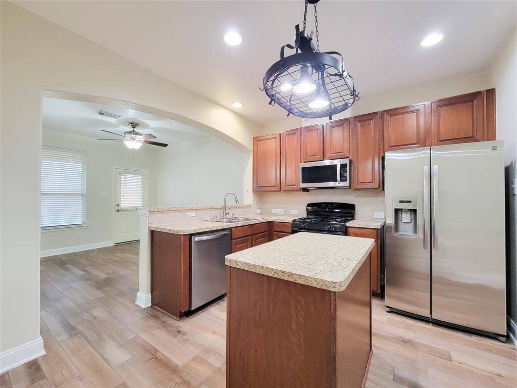Kitchen space with gas appliances.