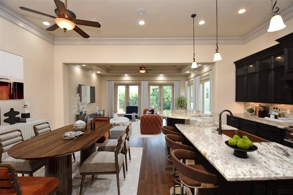 Virtually staged 2nd floor kitchen, dining and living room.