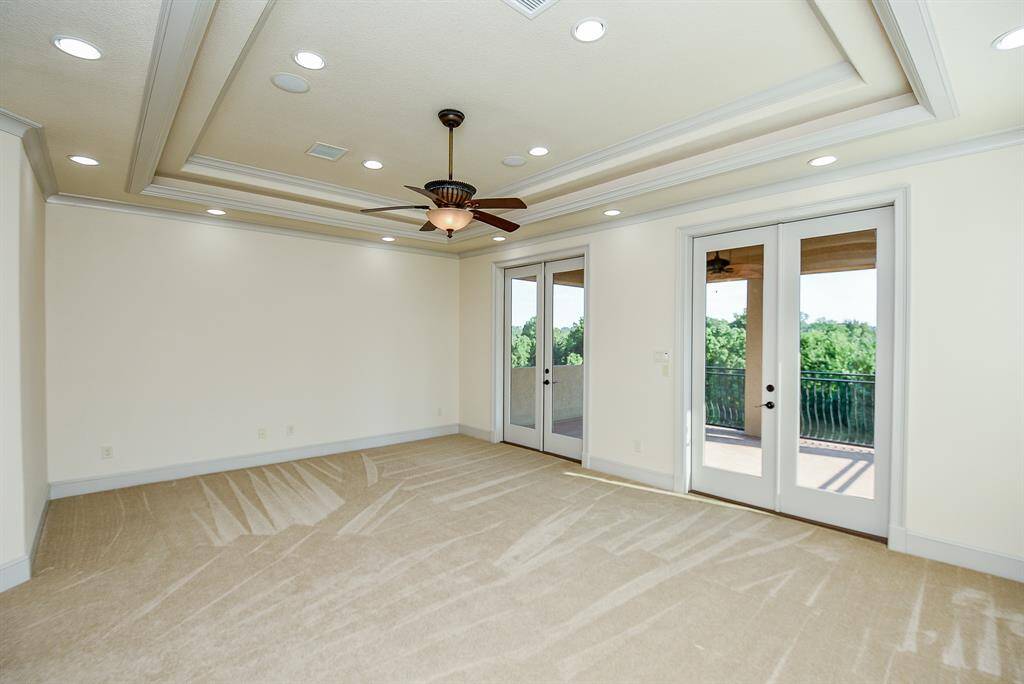 Primary bedroom on 3rd floor with waterfront views.