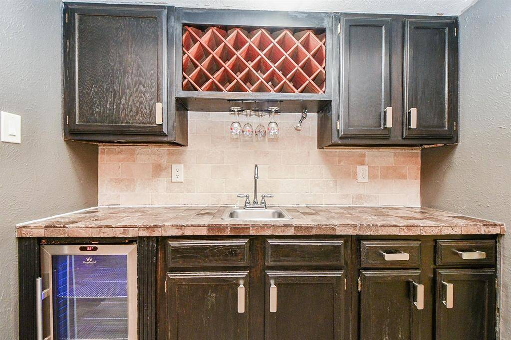 Jazzy Wetbar nestled near Living & Dining Rooms