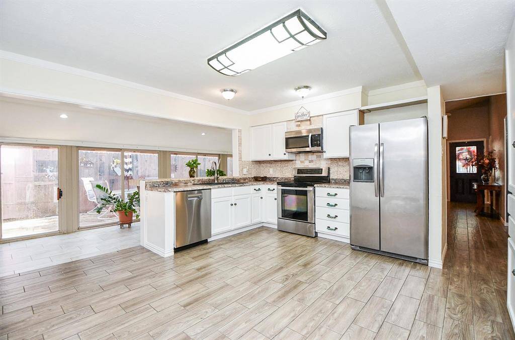 Granite-like counter tops w/custom waterfall edge