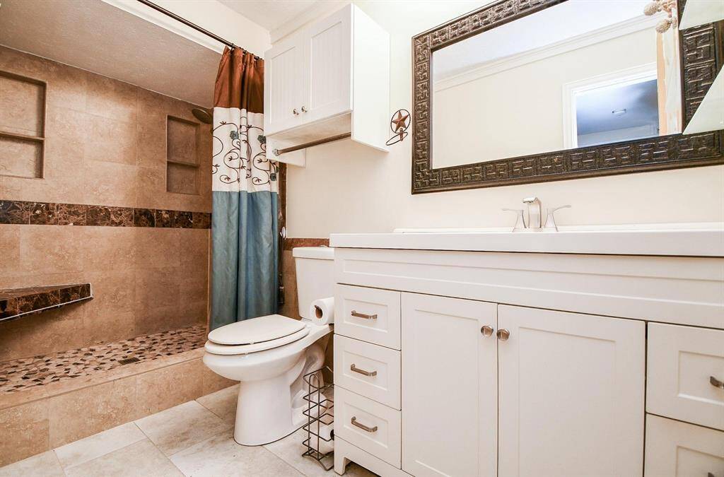 Primary Bath Renovated Vanity & Designer Mirror