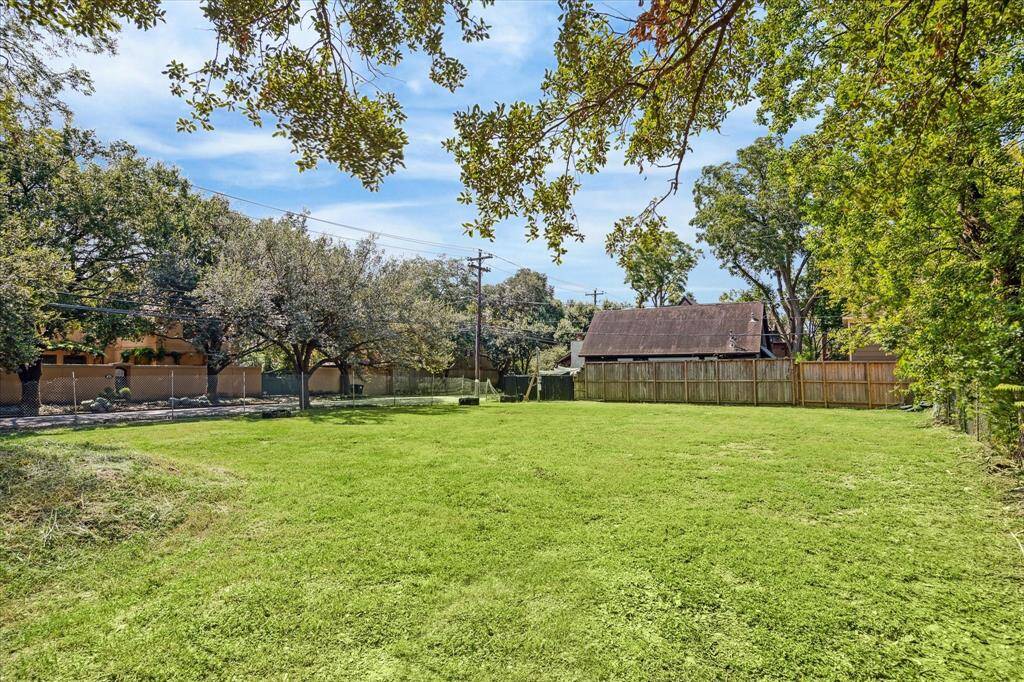 Cleared corner lot and ready to build a residential single family home.