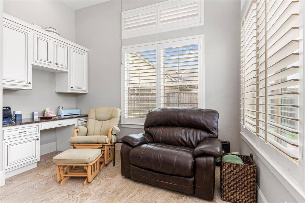Enjoy the wonderful sunroom, featuring an upgraded work station perfect for working from home. With an amazing view of the pool and lush landscaping, it’s an ideal spot to stay productive while keeping an eye on the children playing in the backyard!