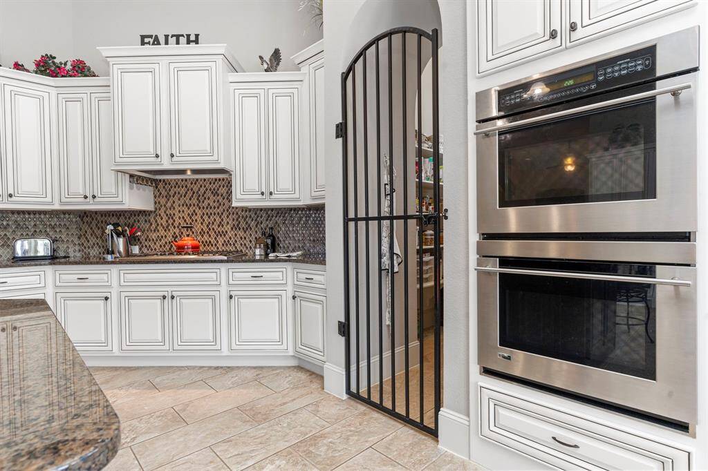 Enjoy the massive eat-in working station island, offering all the storage you could need! From every corner of the home, you’ll be captivated by the amazing views!