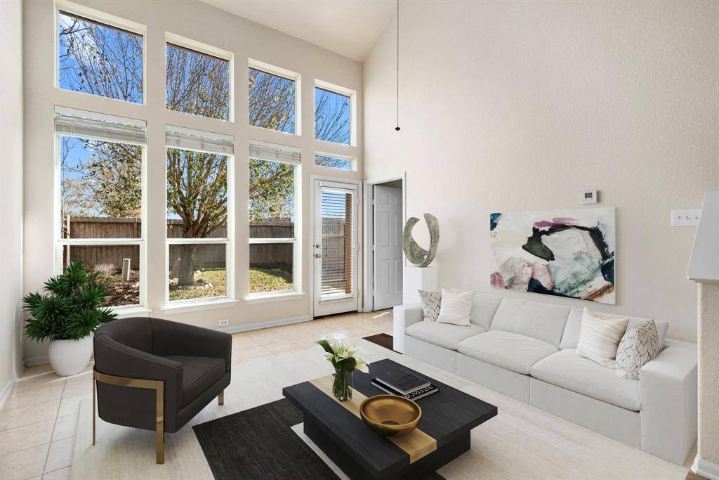 Living room virtually staged. High ceilings!