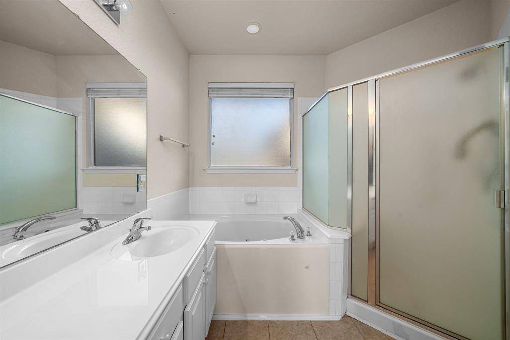 primary bathroom separate tub and shower