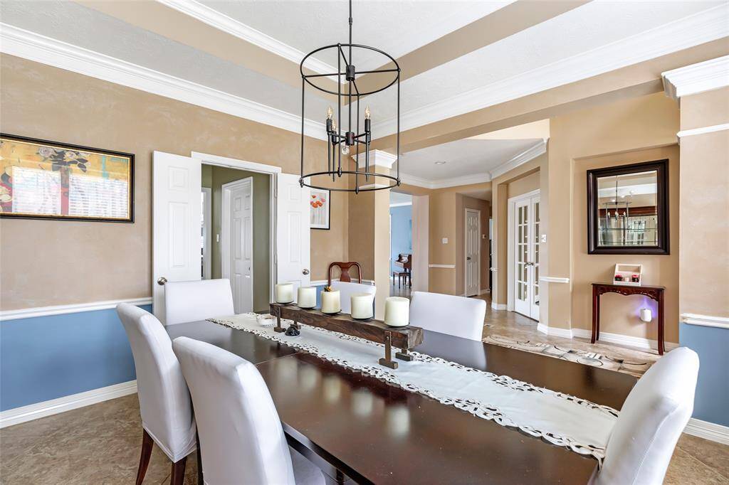 Formal dining room has direct access to the kitchen to easily serve during holidays and special events.