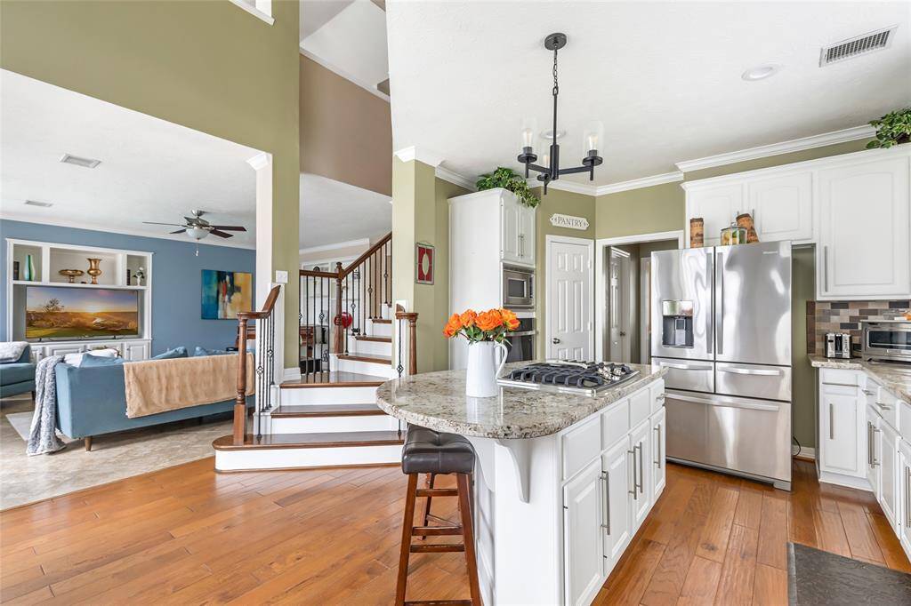 Another view to kitchen and family room.