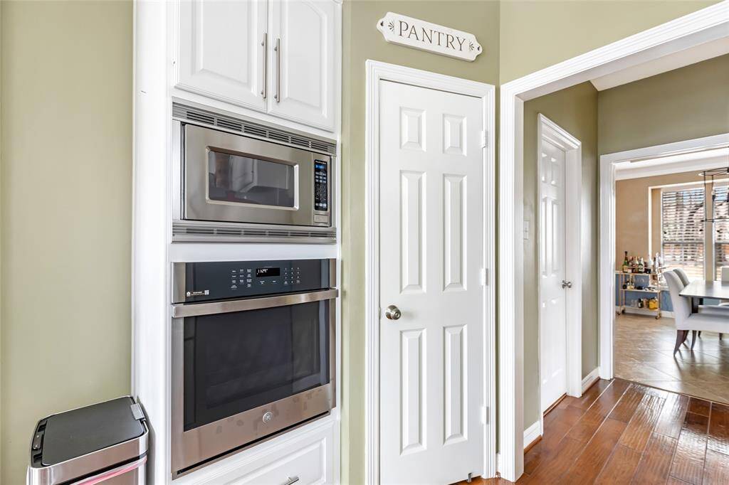 View through to the dining room. Pantry is spacious and utility room is located here.
