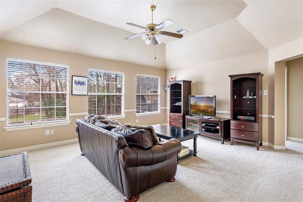 Upstairs is all about the kids! This game room is spacious and provides triple window back yard view and lots of natural lighting.