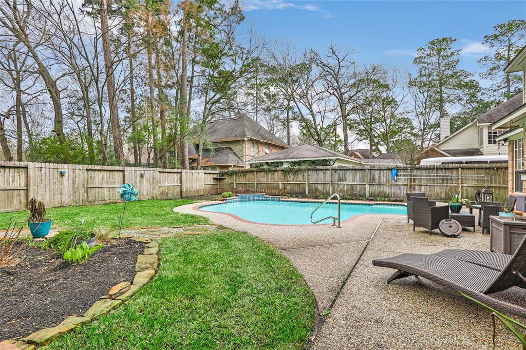 Back yard view. Tons of patio space - just bring your table and chairs!