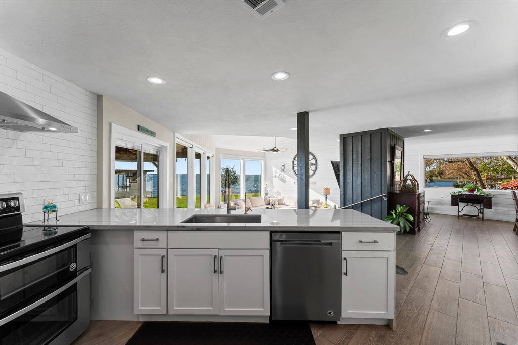 Kitchen peninsula/breakfast bar overlooking the living room