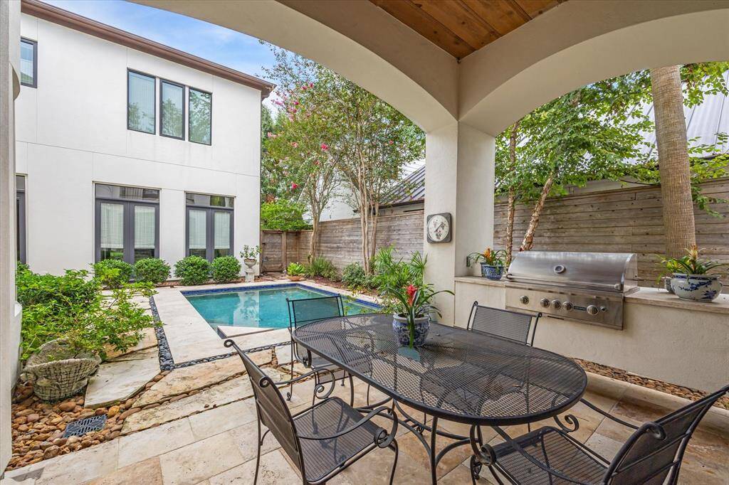 Private courtyard with a sparkling pool.