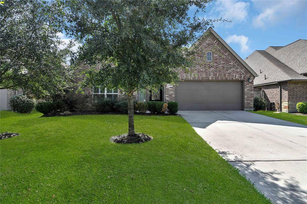 With its classic brick elevation, lush green grass, and maturing trees, this home exudes A+ curb appeal.