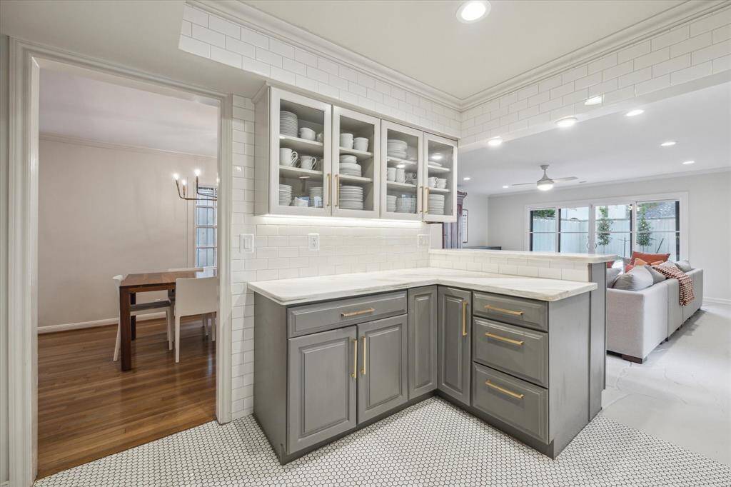 Kitchen has tons of storage and a breakfast bar