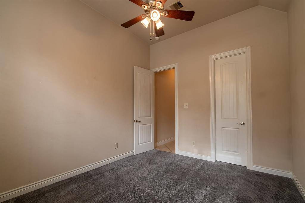 26059 N Kings Mill gorgeous wooden front door welcomes you home.