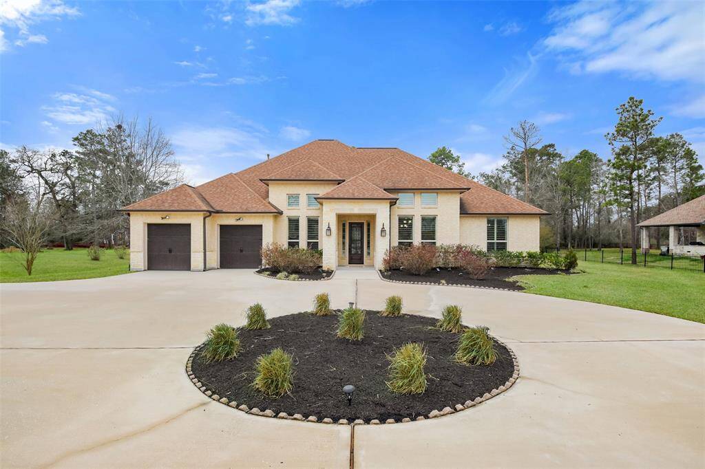 Welcome home to 27523 Wishing Oak Landing in Benders Landing Estates!